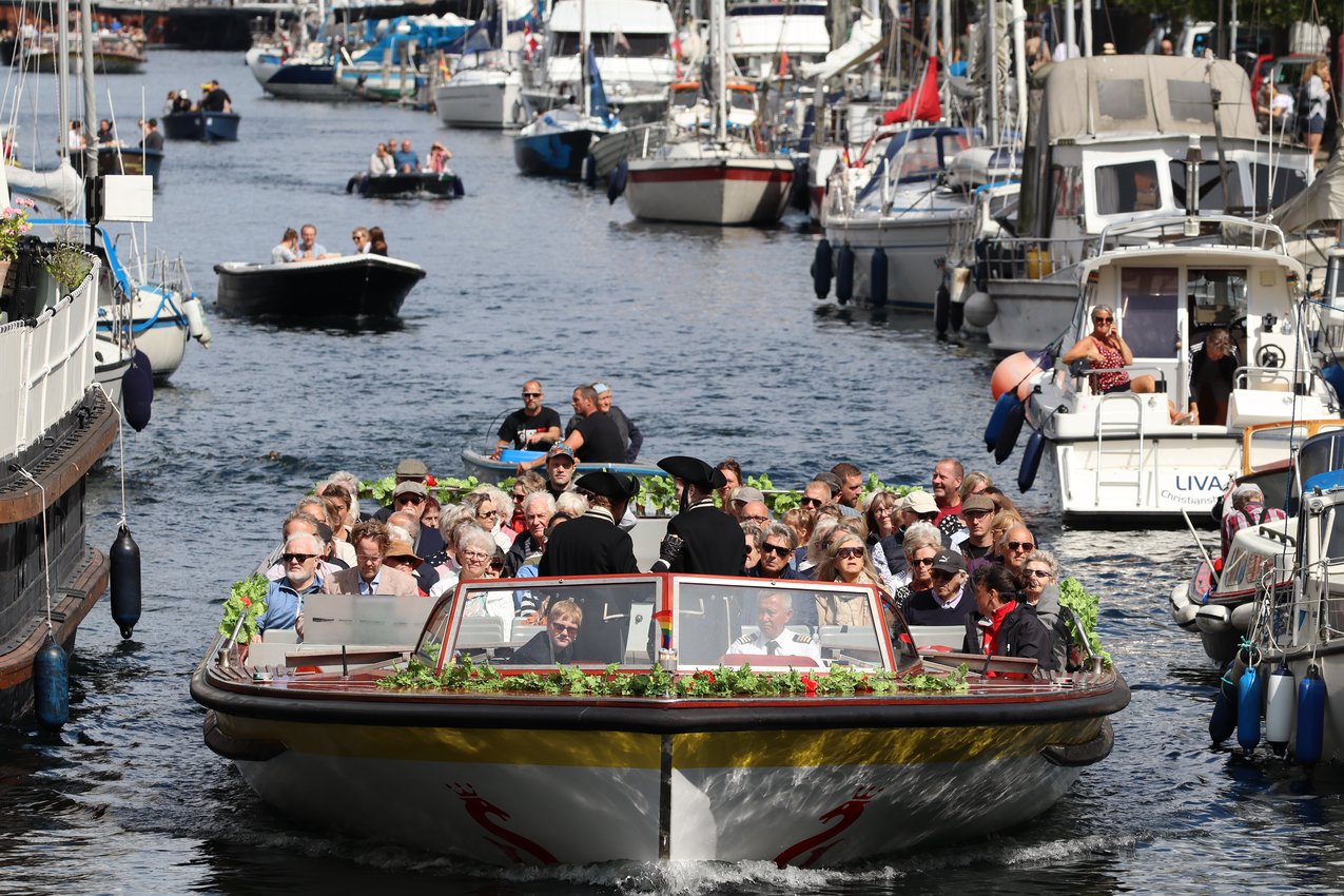 A costumed tourboat on a waterway in Copenhagen