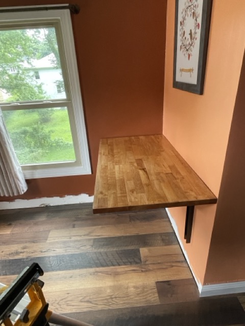 Wall-mounted fold-up butcher block table