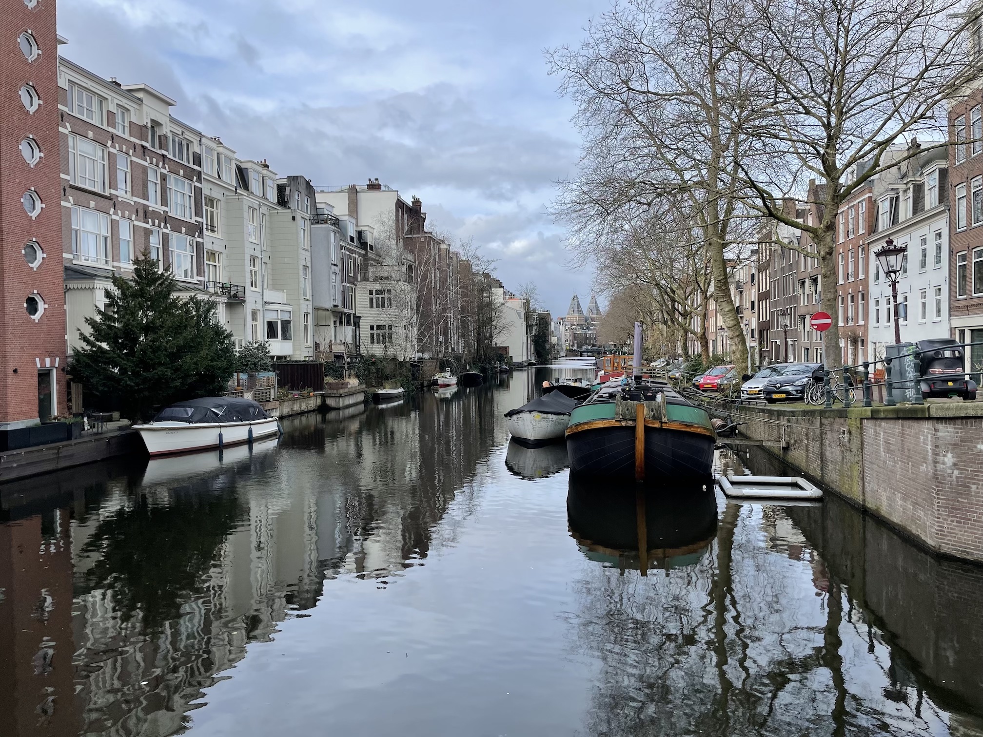 A view of a boat tied up on an Amsterdam canal