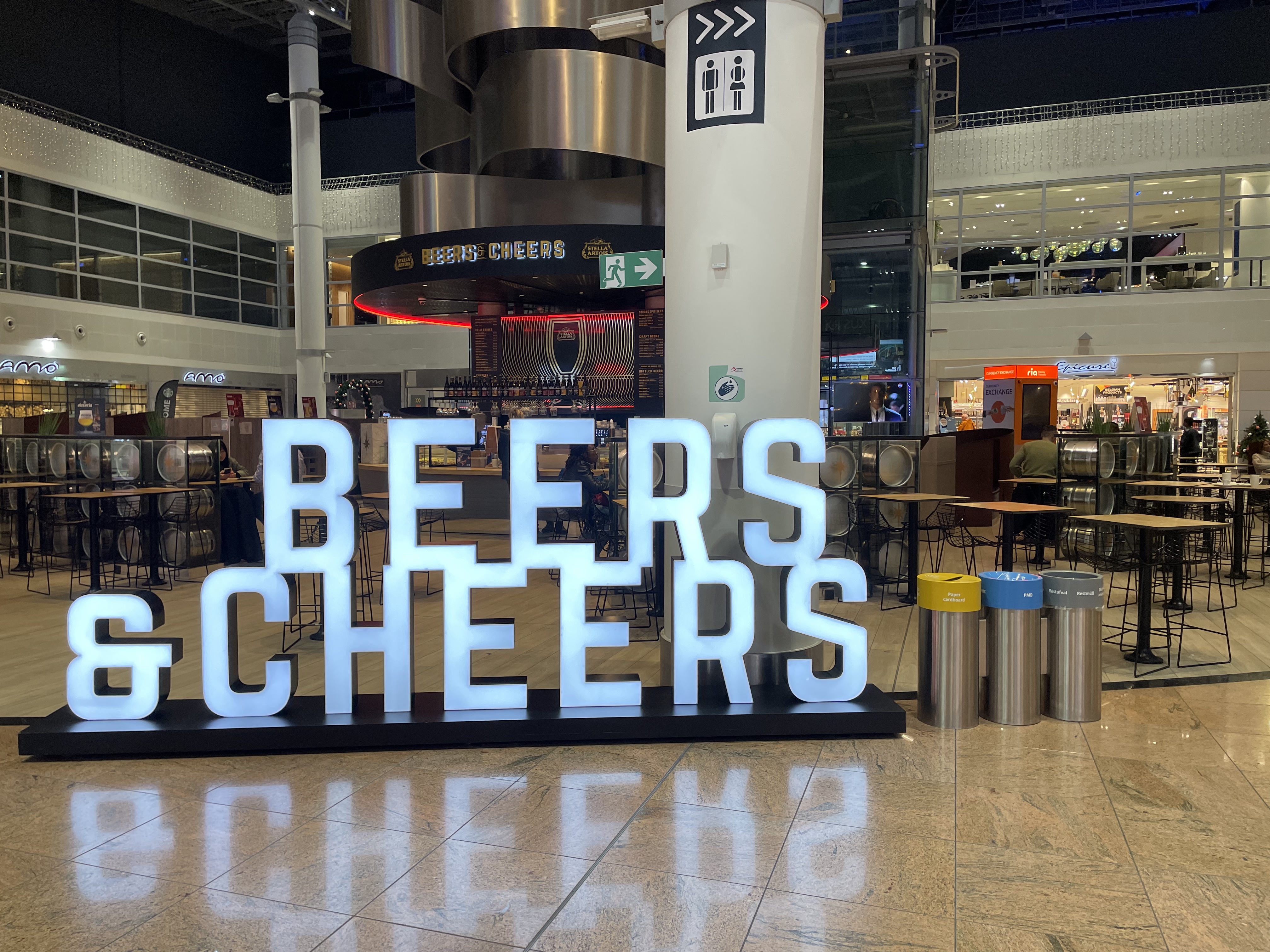 A large sign that says “Beers & Cheers”