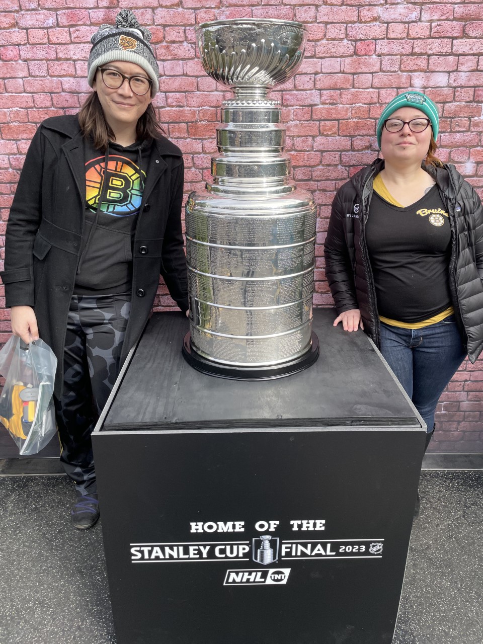 Christine and I standing next to the Stanley Cup