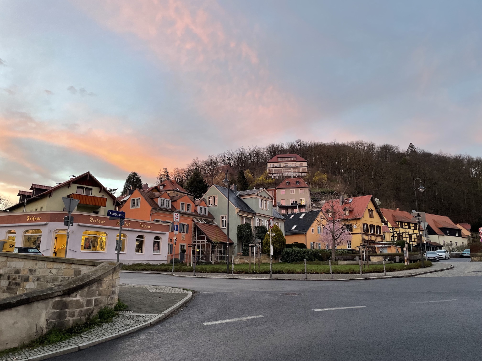 A village center with classical architecture and tightly nestled buildings