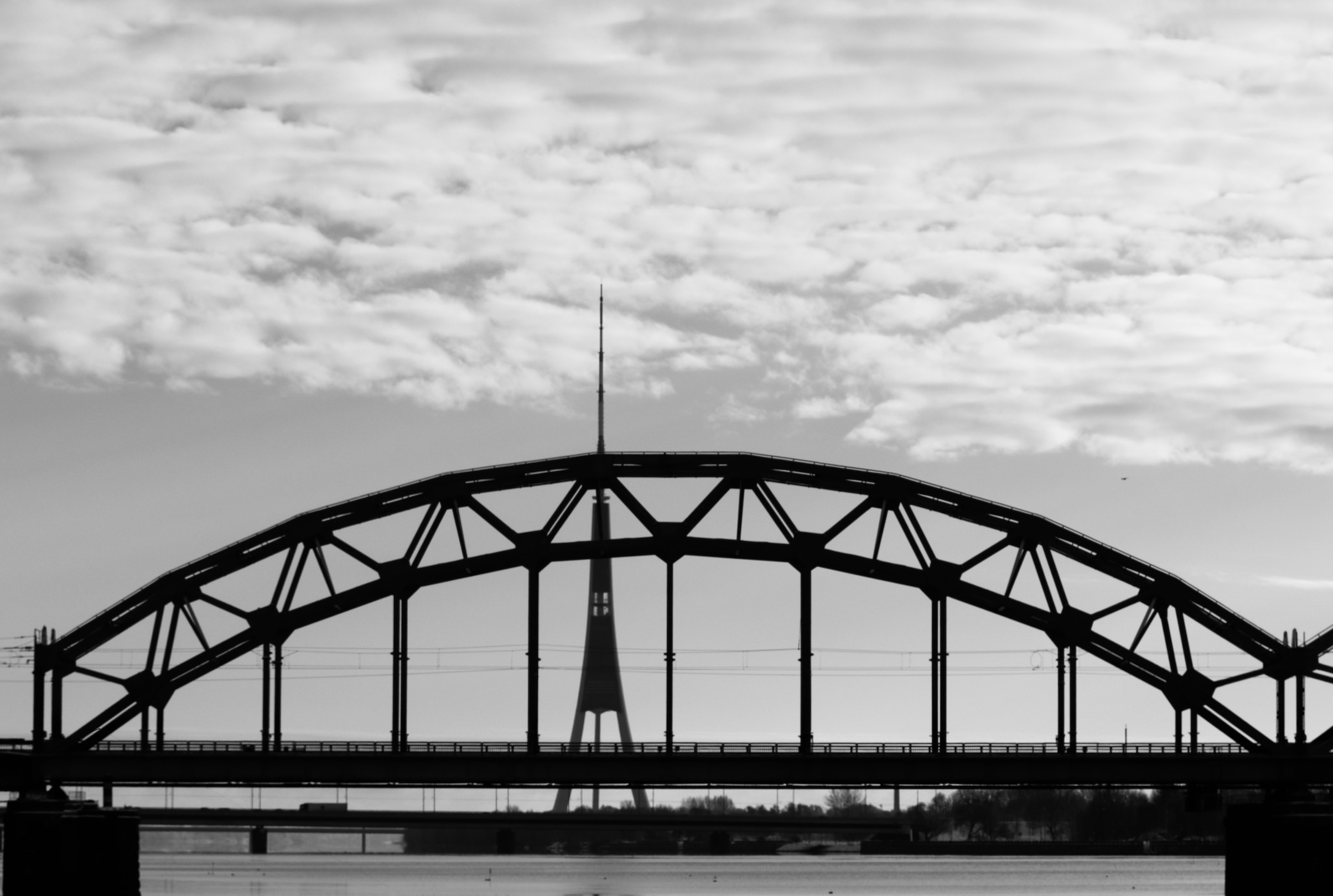 The Riga TV Tower as seen through a bridge